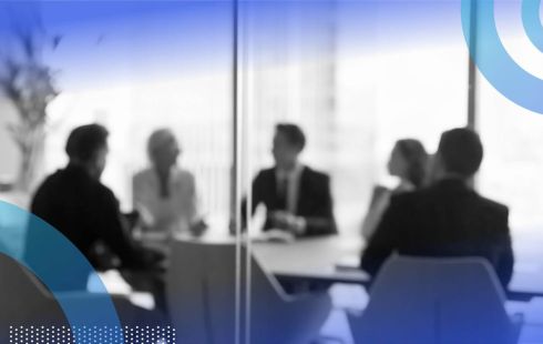 A group of businesspeople in a conference room