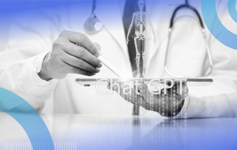 A doctor holds a tablet with an image of a skeleton and the words ChatGPT underneath